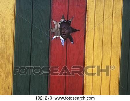 Boy Looking Through Hole In Wall View Large Photo Image Stock Image - Boy Looking Through Hole In Wall. Fotosearch