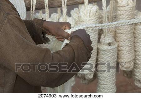 Boy Making Sisal Rope Along The Road Between Ambositra & Ambavalao, Fianarantsoa Province, Madagascar View Large Photo Image Stock Image - Boy Making Sisal Rope Along The Road Between Ambositra & Ambavalao, Fianarantsoa Province, Madagascar. Fotosearch