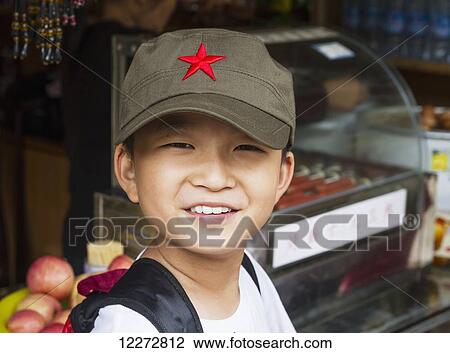 Stock Image - Boy, Mount Huangshan, Anhui, China. Fotosearch