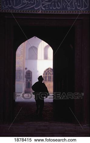 Boy Silouhetted Against The Opening Of Mosque View Large Photo Image Stock Photography - Boy Silouhetted Against The Opening Of Mosque. Fotosearch