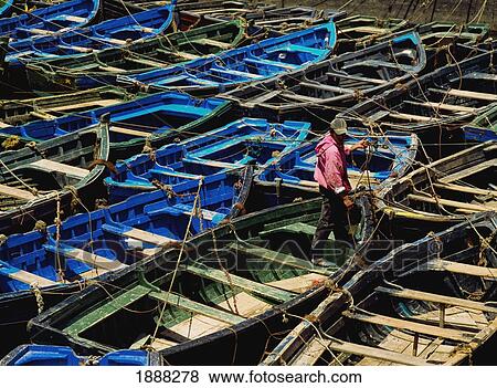 Boy Sorting Out Boats View Large Photo Image Stock Photo - Boy Sorting Out Boats. Fotosearch