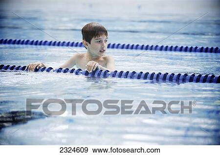 Boy Standing In Swimming Lane Looking Cold View Large Photo Image Stock Photo - Boy Standing In Swimming Lane Looking Cold. Fotosearch