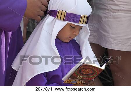 Boy Wearing Purple As A Sign Of Mourning Reading During The Procession Of The Holy Cross On Good Friday In Antigua Guatemala, Sacatep View Large Photo Image Stock Image - Boy Wearing Purple As A Sign Of Mourning Reading During The Procession Of The Holy Cross On Good Friday In Antigua Guatemala, Sacatep. Fotosearch