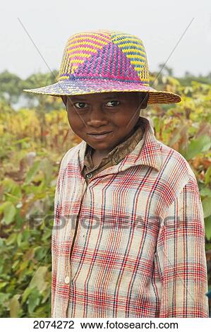 Boy With A Straw Hat, Ranomafana, Fianarantsoa Province, Madagascar View Large Photo Image Stock Image - Boy With A Straw Hat, Ranomafana, Fianarantsoa Province, Madagascar. Fotosearch