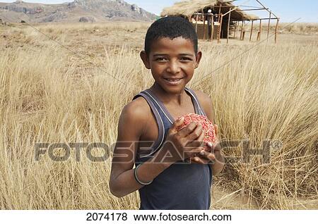 Boy With Homemade Football Anja, Fianarantsoa Province, Madagascar View Large Photo Image Stock Photo - Boy With Homemade Football Anja, Fianarantsoa Province, Madagascar. Fotosearch
