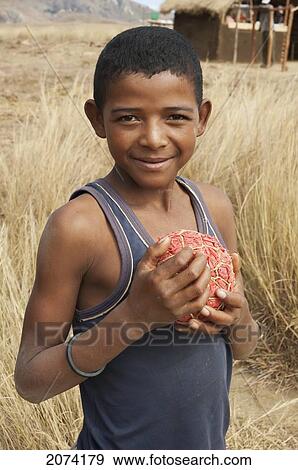 Boy With Homemade Football Anja, Fianarantsoa Province, Madagascar View Large Photo Image Stock Photo - Boy With Homemade Football Anja, Fianarantsoa Province, Madagascar. Fotosearch