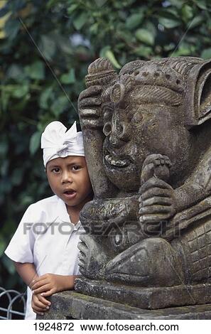 Boy With Stone Carved Temple Fighure View Large Photo Image Stock Image - Boy With Stone Carved Temple Fighure. Fotosearch