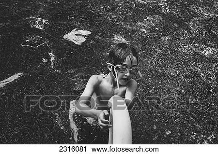 Boy With Swimming Goggles In Pool; Otterburn Park Quebec Canada View Large Photo Image Stock Image - Boy With Swimming Goggles In Pool; Otterburn Park Quebec Canada. Fotosearch