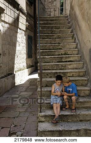 Boys Playing Cards On Steps, Kotor Monte. Tif View Large Photo Image Stock Photo - Boys Playing Cards On Steps, Kotor Monte. Tif. Fotosearch