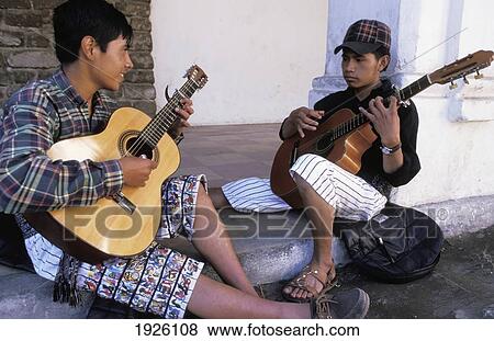 Stock Photo - Boys Playing Guitars. Fotosearch