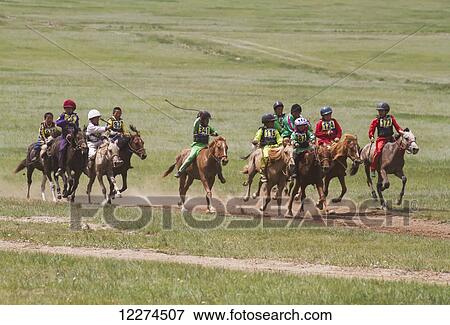 Boys racing horses in the Daaga (two-year old) horse race held during the 2014 Naadam Mongolian National Festival at Khui Doloon Khudag, the horse racing ground, Ulan Bator, Mongolia View Large Photo Image Stock Photo - Boys racing horses in the Daaga (two-year old) horse race held during the 2014 Naadam Mongolian National Festival at Khui Doloon Khudag, the horse racing ground, Ulan Bator, Mongolia. Fotosearch
