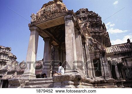 Boys Sitting At Temple Entrance At Angkor Wat View Large Photo Image Stock Image - Boys Sitting At Temple Entrance At Angkor Wat. Fotosearch