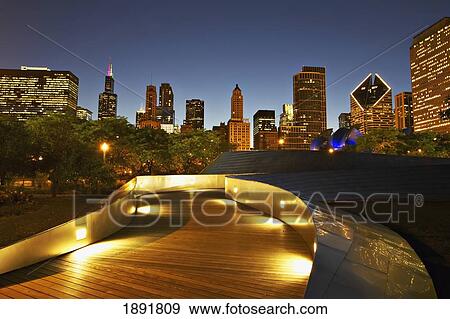 Bp Amoco Bridge, With City Skyline In Background At Dusk View Large Photo Image Stock Photo - Bp Amoco Bridge, With City Skyline In Background At Dusk. Fotosearch