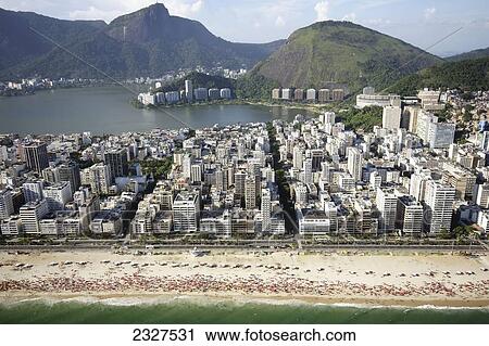Stock Image - Brazil, Aerial view of coastline and city; Rio de Janeiro. Fotosearch