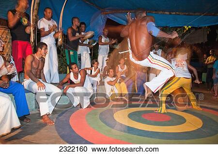 Brazil, Bahia, Itacare, Brazilian martial arts/dance practice of Capoeira View Large Photo Image Stock Image - Brazil, Bahia, Itacare, Brazilian martial arts/dance practice of Capoeira. Fotosearch