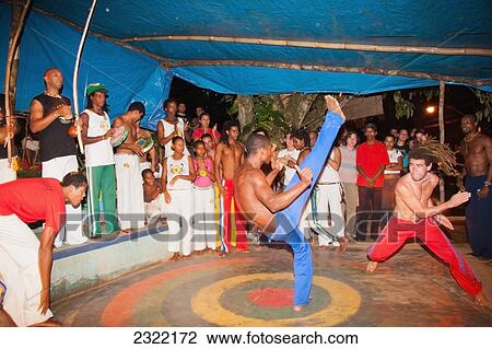 Brazil, Bahia, Itacare, Brazilian martial arts/dance practice of Capoeira View Large Photo Image Stock Image - Brazil, Bahia, Itacare, Brazilian martial arts/dance practice of Capoeira. Fotosearch