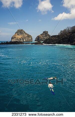 Brazil, Pernambuco, Tourists snorkeling; Fernando de Noronha View Large Photo Image Stock Image - Brazil, Pernambuco, Tourists snorkeling; Fernando de Noronha. Fotosearch