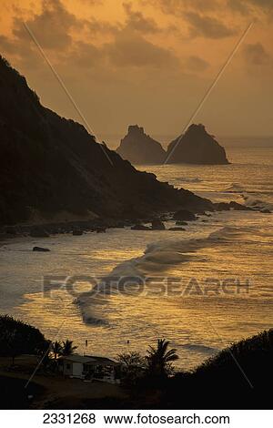 Brazil, Pernambuco, View of Morro do Pico at sunset from Forte dos Remedios; Fernando de Noronha View Large Photo Image Stock Photo - Brazil, Pernambuco, View of Morro do Pico at sunset from Forte dos Remedios; Fernando de Noronha. Fotosearch