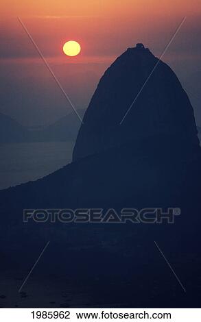 Brazil, Rio De Janeiro, Sugarloaf Mountain Silhouetted At Sunset. View Large Photo Image Stock Image - Brazil, Rio De Janeiro, Sugarloaf Mountain Silhouetted At Sunset.. Fotosearch