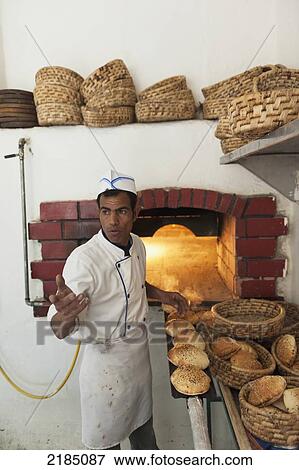 Bread Making At The Bakery At Haret Jdoudna, Madaba, Jordan, Middle East View Large Photo Image Stock Photo - Bread Making At The Bakery At Haret Jdoudna, Madaba, Jordan, Middle East. Fotosearch