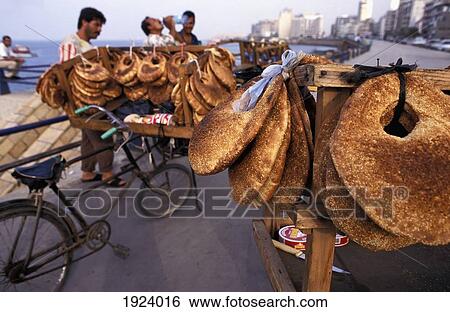 Stock Photograph - Bread Vendor On The Corniche. Fotosearch