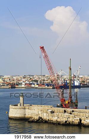 Breakwater Construction And Lighthouse; Port Of Leixoes, Porto, Portugal View Large Photo Image Stock Photo - Breakwater Construction And Lighthouse; Port Of Leixoes, Porto, Portugal. Fotosearch