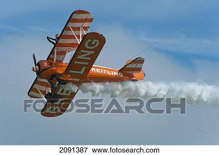 Breitlng Wing Walkers In Action At The Eastbourne Airshow, East Sussex, Uk View Large Photo Image Stock Photo - Breitlng Wing Walkers In Action At The Eastbourne Airshow, East Sussex, Uk. Fotosearch
