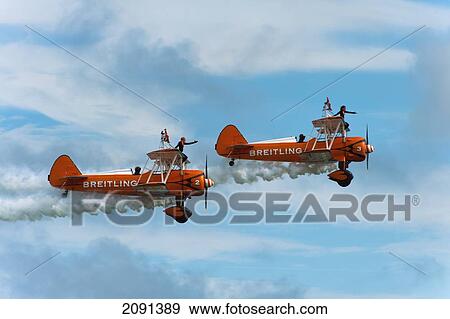 Stock Photo - Breitlng Wing Walkers In Action At The Eastbourne Airshow, East Sussex, Uk. Fotosearch