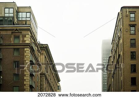 Brick Buildings And Skyscraper On Foggy Morning, Downtown Montreal, Quebec View Large Photo Image Stock Photo - Brick Buildings And Skyscraper On Foggy Morning, Downtown Montreal, Quebec. Fotosearch