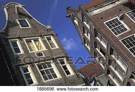Brick Houses In Amsterdam, Low Angle View View Large Photo Image Stock Photograph - Brick Houses In Amsterdam, Low Angle View. Fotosearch