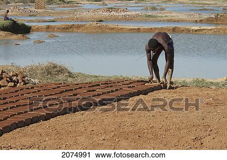 Brick Makers, Antsokay, Toliara Province, Madagascar View Large Photo Image Stock Image - Brick Makers, Antsokay, Toliara Province, Madagascar. Fotosearch