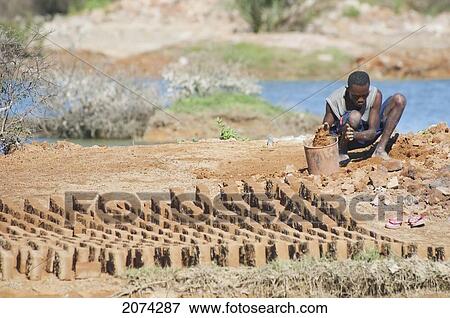 Brick Makers, Antsokay, Toliara Province, Madagascar View Large Photo Image Stock Photo - Brick Makers, Antsokay, Toliara Province, Madagascar. Fotosearch
