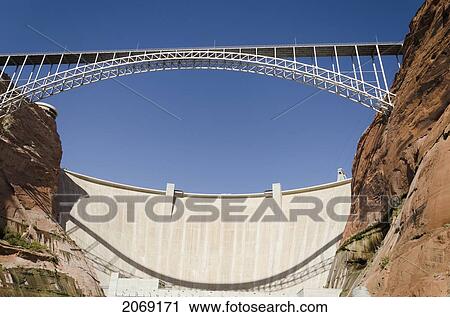Stock Image - Bridge Crossing Colorado River And Glen Canyon Dam; Arizona United States Of America. Fotosearch