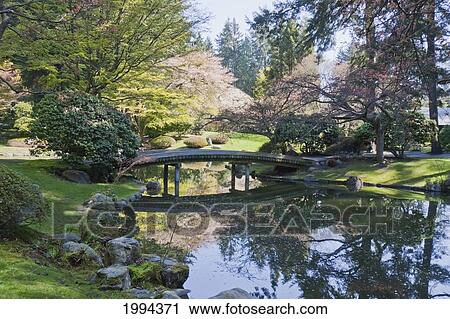 Stock Image - Bridge In Nitobe Memorial Garden, A Traditional Japanese Tea And Stroll Garden Located At The University Of British Columbia, Vancouver, British Columbia, Canada. Fotosearch