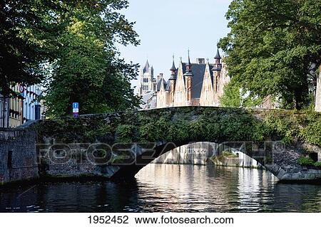 Bridge Over A Canal, Bruges (Brugge), West Flanders, Belgium View Large Photo Image Stock Image - Bridge Over A Canal, Bruges (Brugge), West Flanders, Belgium. Fotosearch