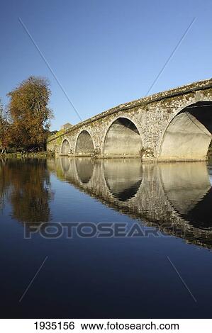 Stock Photograph - Bridge Over River Nore; Bennettsbridge, County Kilkenny, Ireland. Fotosearch