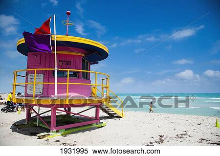 Brightly Colored Pink & Yellow Life Guards Tower; South Beach, Miami, Florida, Usa. View Large Photo Image Stock Photography - Brightly Colored Pink & Yellow Life Guards Tower; South Beach, Miami, Florida, Usa.. Fotosearch