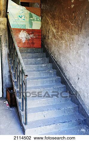 Stock Image - Broken Mirror On A Door At The Top Of Concrete Steps; Beijing China. Fotosearch