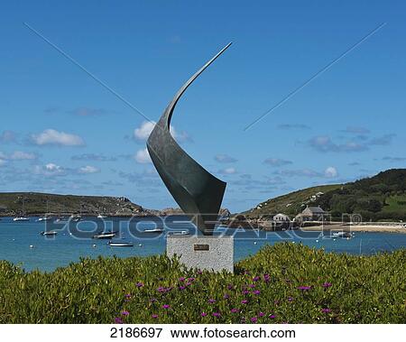 Stock Photo - Bronze Sculpture By Tom Leaper Outside The Flying Boat Club, Tresco, Isles Of Scilly, Cornwall, Uk, Europe. Fotosearch