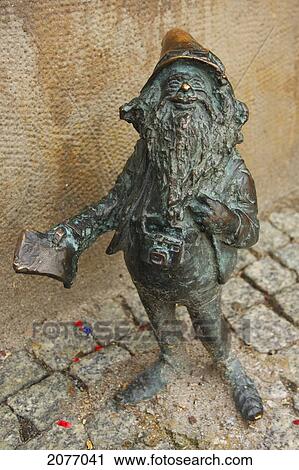 Bronze Sculpture Of A Gnome Outside The Tourist Office; Wroclaw Poland View Large Photo Image Stock Image - Bronze Sculpture Of A Gnome Outside The Tourist Office; Wroclaw Poland. Fotosearch