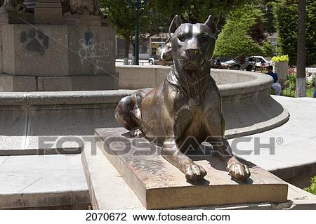 Stock Image - Bronze Statue Of A Dog On Plaza 10 De Febrero, Oruro, Bolivia. Fotosearch