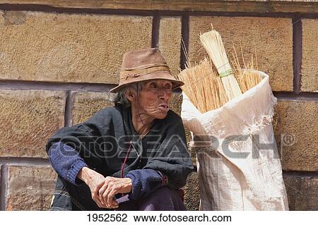 Broom vendor sitting against wall, Sucre, Chuquisaca Department, Bolivia View Large Photo Image Stock Image - Broom vendor sitting against wall, Sucre, Chuquisaca Department, Bolivia. Fotosearch