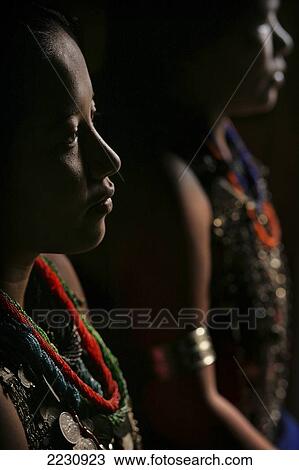 Bru Tribe / Tribal Women In Traditional Dress Wearing Beads And Coin Jewelry, Also Known As Reang Tribe, Naisingpara Refugee Camp, Tripura, North East States, India Pic: Copyright Timothy Allen / Axiom View Large Photo Image Stock Image - Bru Tribe / Tribal Women In Traditional Dress Wearing Beads And Coin Jewelry, Also Known As Reang Tribe, Naisingpara Refugee Camp, Tripura, North East States, India Pic: Copyright Timothy Allen / Axiom. Fotosearch