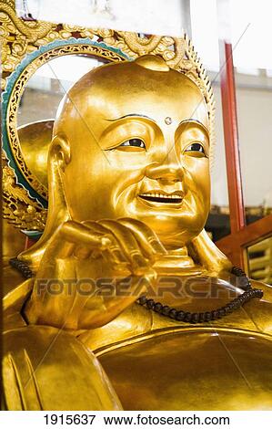 Stock Photo - Budda Statue In Sam Poh Tong Temple. Fotosearch