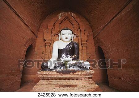 Stock Photo - Buddha statue at Bagan pagodas, Upper Burma; Myanmar. Fotosearch