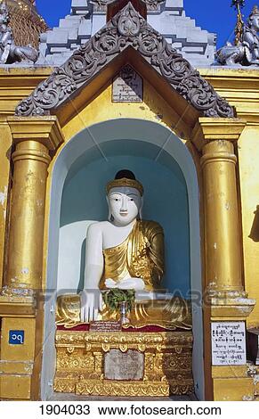 Stock Image - Buddha Statue At Shwedagon Paya, Yangon, Burma. Fotosearch