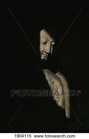 Buddha Statue In Shadows, Yungang Caves, Wuzhou Shan Mountains, China View Large Photo Image Stock Photography - Buddha Statue In Shadows, Yungang Caves, Wuzhou Shan Mountains, China. Fotosearch