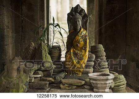 Buddha statue on a table in Bayon Wat, Angkor; Siem Reap, Cambodia View Large Photo Image Stock Photography - Buddha statue on a table in Bayon Wat, Angkor; Siem Reap, Cambodia. Fotosearch