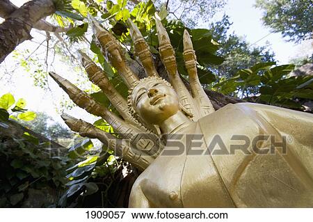 Stock Photo - Buddha Statue On Phu Si Hill, Low Angle View, Luang Prabang, Laos. Fotosearch