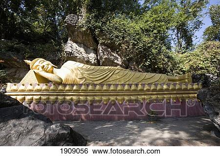 Stock Photograph - Buddha Statue On Phu Si Hill, Luang Prabang, Laos. Fotosearch